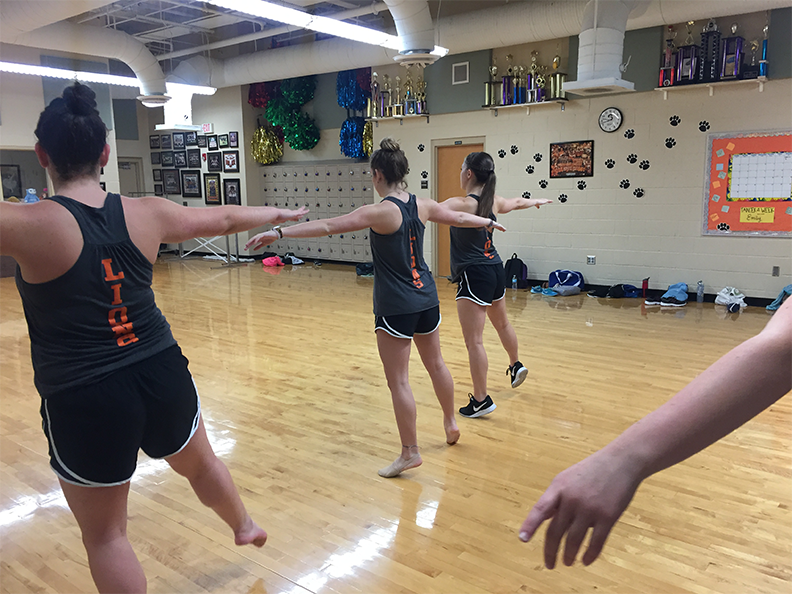 Mane Attraction dancers teach moves to students who attend the clinic on Oct. 1.