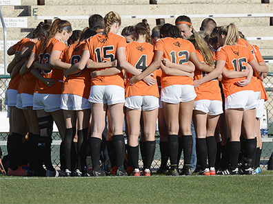 The Oviedo girls' soccer team huddles before their state championship match against Boca Raton in DeLand. The Lions would go on to win 3-1.