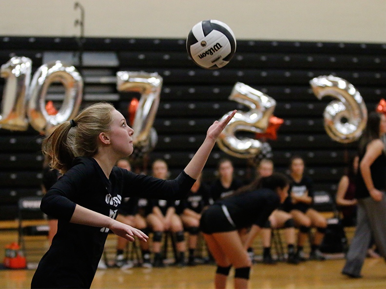 Junior Savannah Vach serves the ball on senior night against Winter Springs on Oct. 3 at the RWL gym.