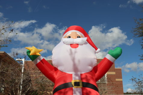 HOLIDAY CHEER- Festive inflatables have appeared around campus as winter break approaches. 