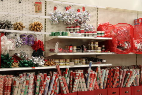 SHOPPING FRENZY: Stores display gift wrap in preparation for the holiday season. 