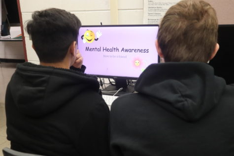 Students, Eric Esquivel, 11, and Hunter Fuehrer, 10, complete their monthly mental health Nearpod for February. 