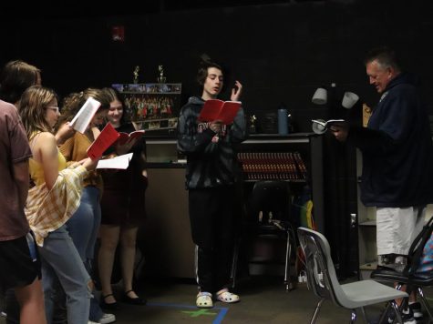 Theatre teacher and director, Tim Carter, hosts rehearsal for the upcoming play Clue.