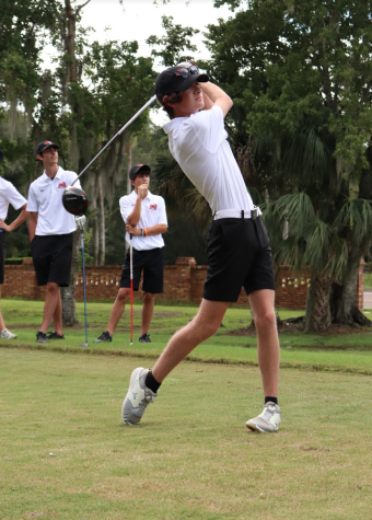 Sophomore Tyler McGrath tees off against Hagerty High School at Twin Rivers Golf Club.