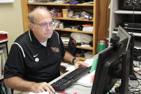 On the chilly morning of Dec. 7, teacher Art Woodruff is adorned in OHS staff attire whilst working at his desk. He is sorting through classwork for his computer science class, managing a routine that gives him the opportunity to dedicate his efforts to Mayorship.