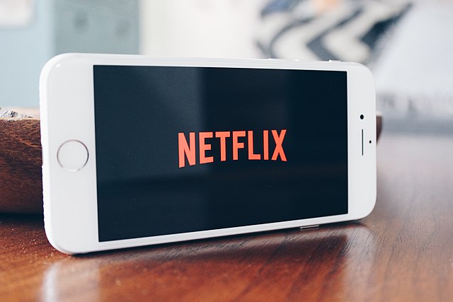 The+Netflix+logo+opens+on+a+phone+screen+as+it+loads.+Photo+by+Stock+Catalog.