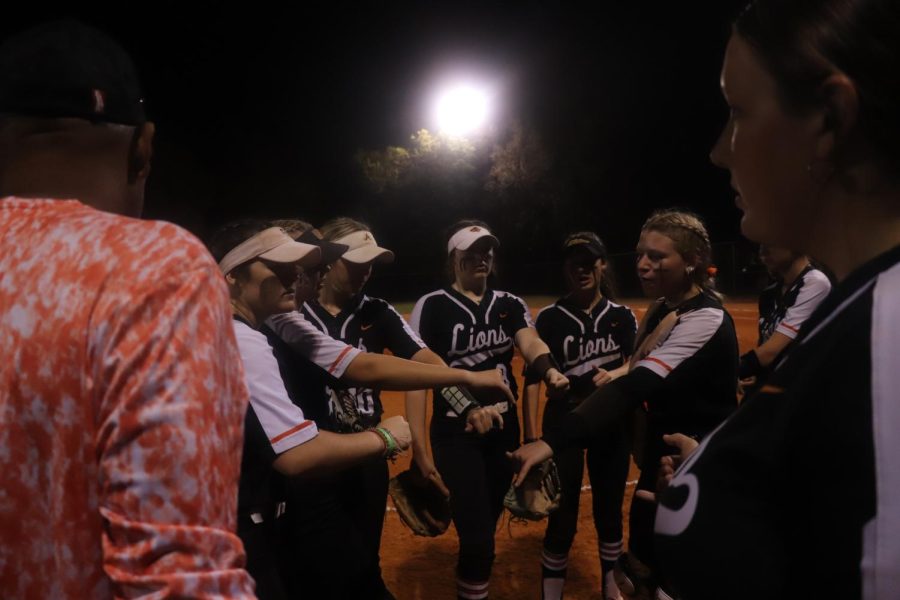 Coach+Anna+Hollis-Childress+leads+the+softball+team+to+a+high-stakes+win.