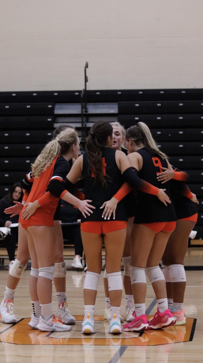 Oviedo girls volleyball bringing it in after losing a long rally.