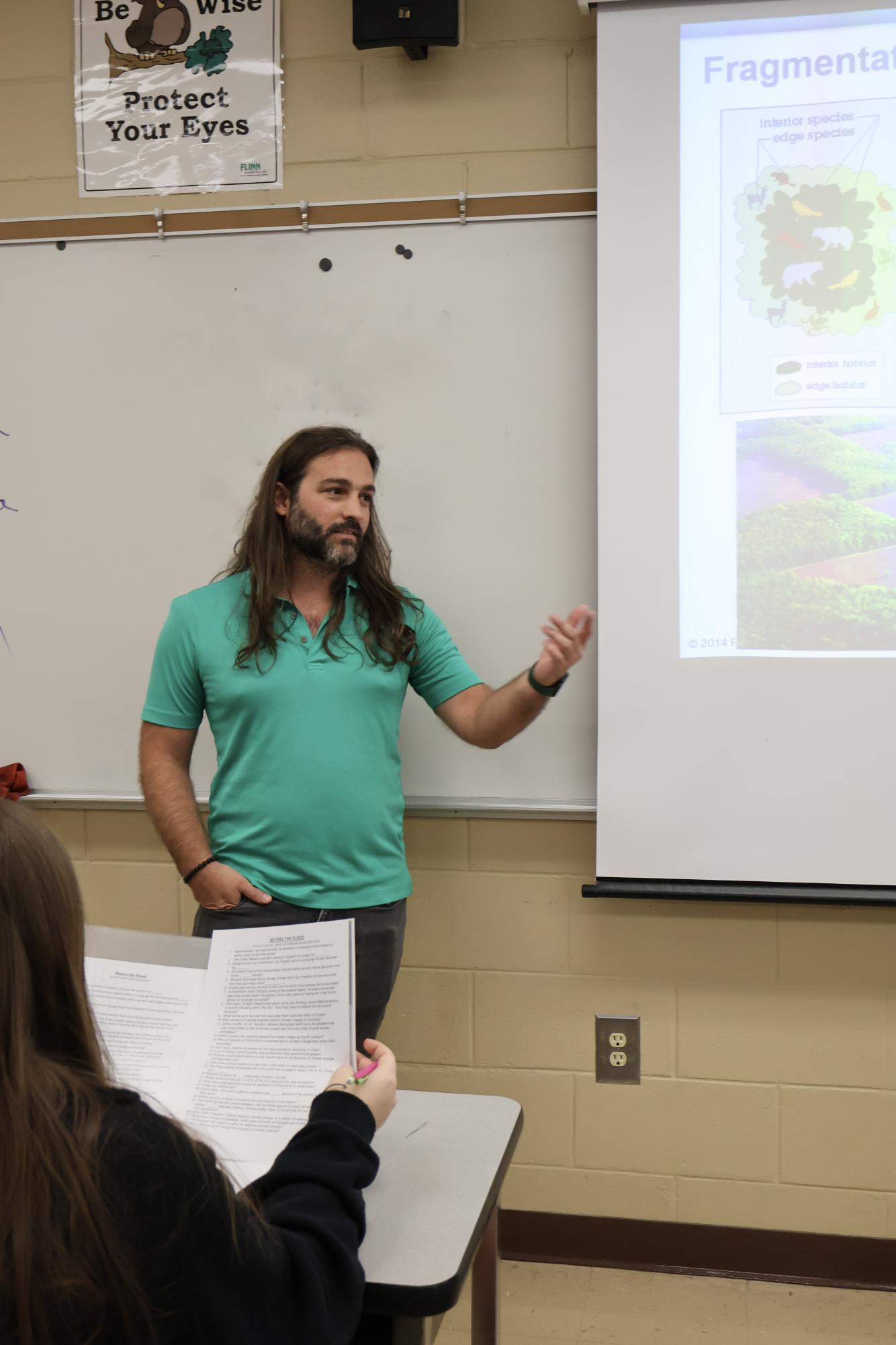 Benjamin Hogue, the AP Environmental Science teacher, shares the importance of the health of the Earth to his class.