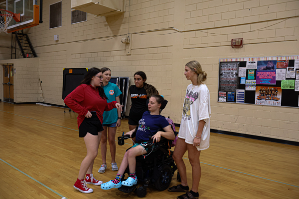 For the people: Best Buddies president Mikayla Barton talks to club members in the old gym at a Special Olympics-themed meeting on September 28. Club attendance and membership has largely increased since Barton became president. This is Barton’s fourth year in the club and first as president.