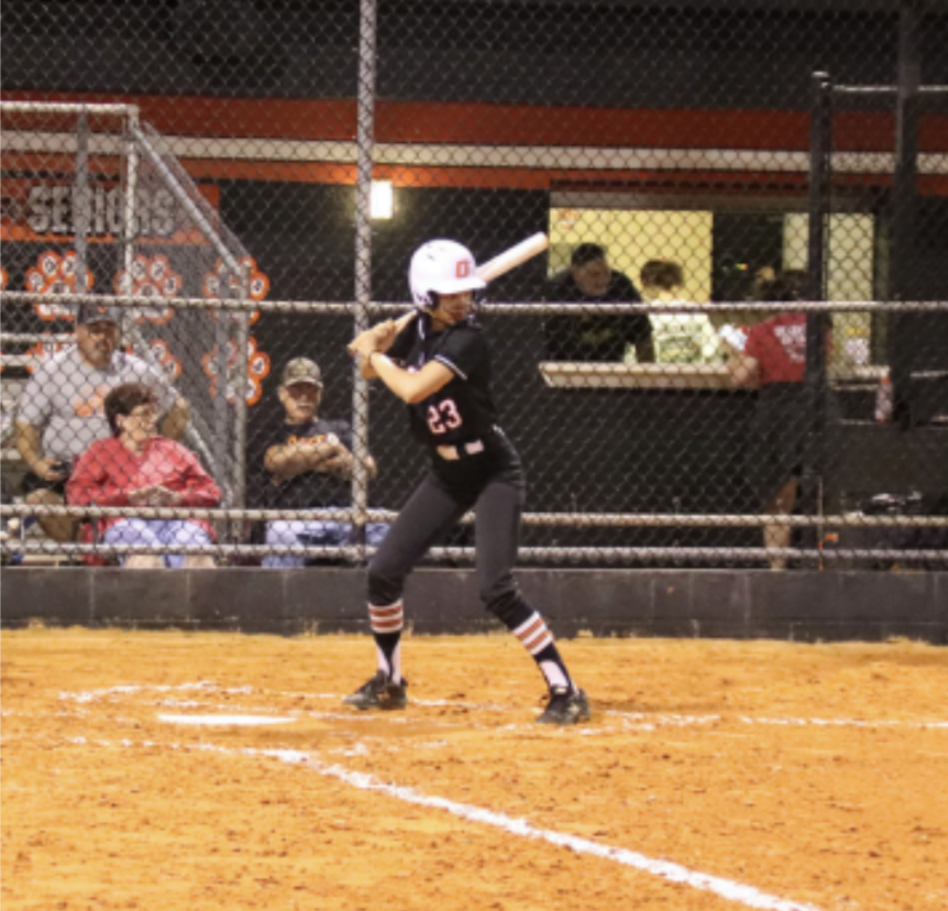 At bat: Varsity softball player Jamison Townsend waits by the plate to bat against Lake Mary High School on March 7. Townsend contributed to the 9-0 Lions win with 1 run batted out of 4 plate appearances.