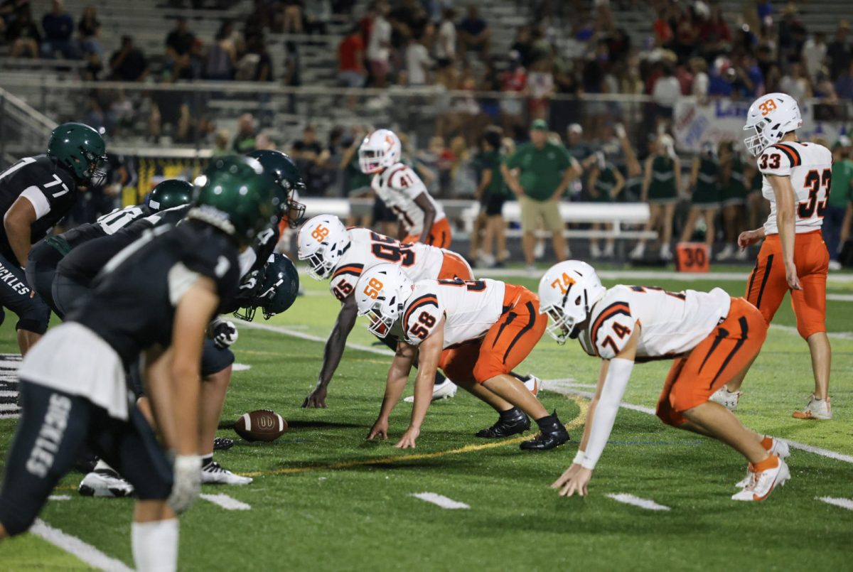 The Lions defensive line gets set before a play