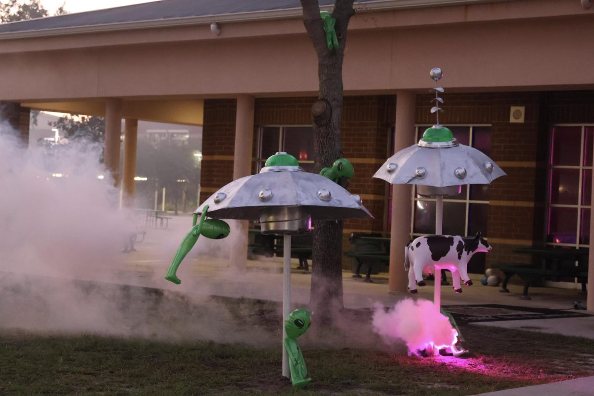 Space themed decorations line the walkway into Oviedo High School's homecoming dance. 