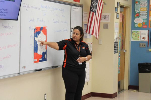 Miranda Masoud teaches her students different locations on a map of France. Masoud is one of several new teachers at Oviedo High School this year. She has found Oviedo a very welcoming school and appreciates the strong sense of community found among her department.