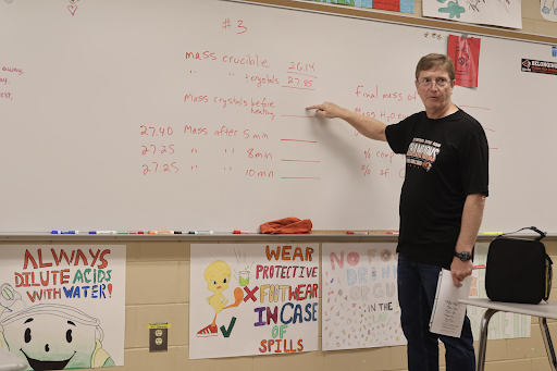 Waisanen explains an upcoming lab to his AP Chemistry students. These hands-on labs help teach his students about the topics and enjoy their time in his class. This has helped students pass the class and succeed for years in chemistry at OHS.