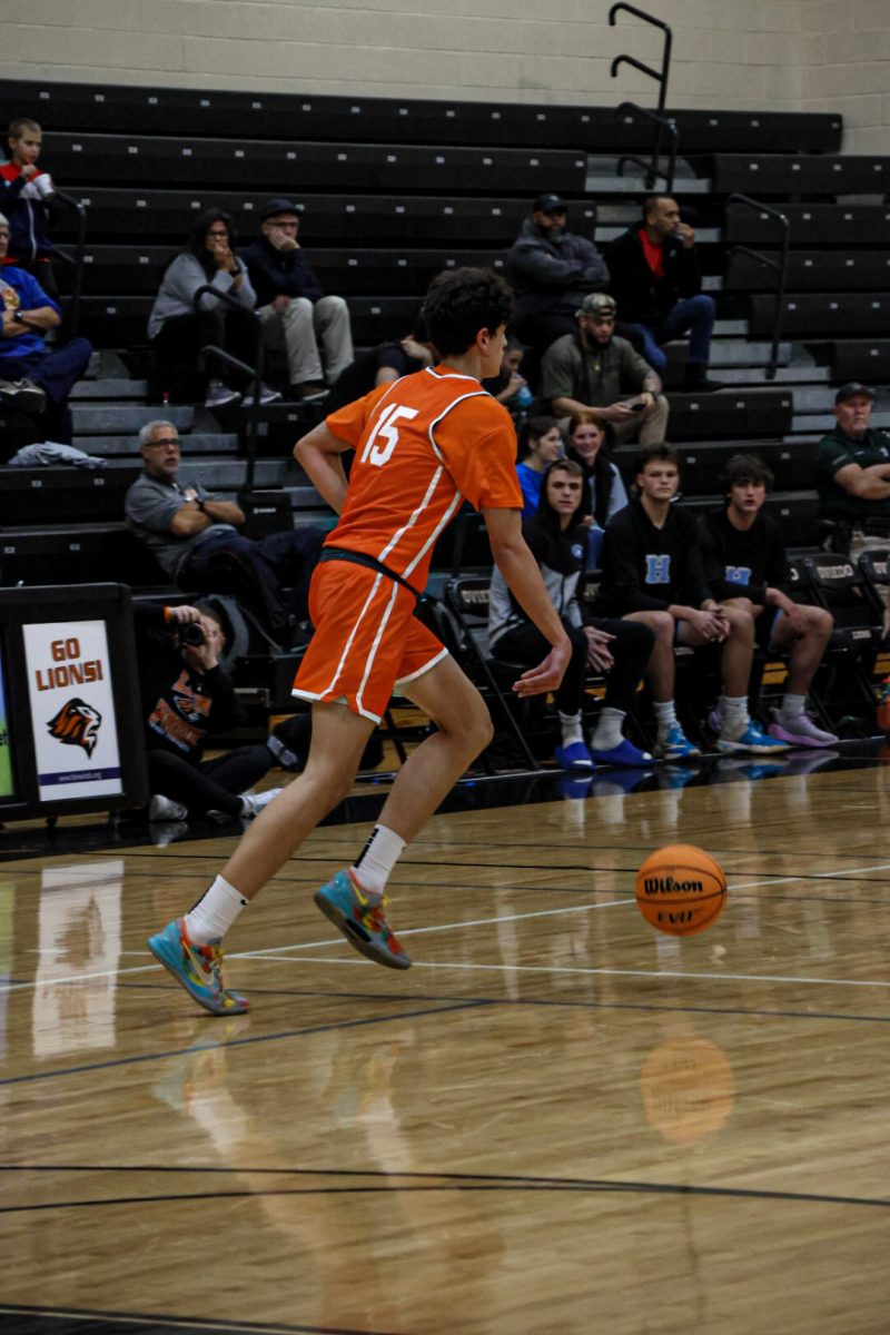 Ethan Diaz brings the ball up the floor while the offense gets set. 