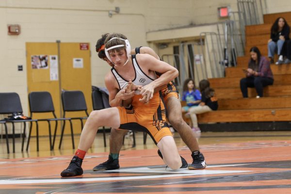 Sophomore wrestlers Trey Roberson, and Donavan (Jared) Bain wrestling at Oviedo Orange and Black duels.