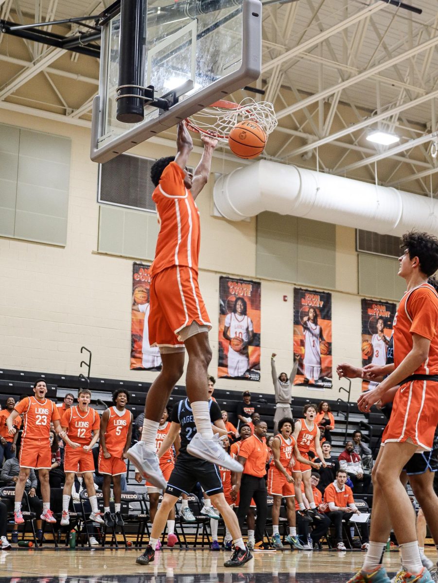 Oviedo bench gets hype after Cameron Bryant slam. 