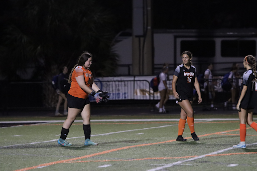 Rachel Brammer (11) advises teammates in a 3-0 victory over West Orange High School. Thanks to Brammer and the defense the Lions only allowed two goals all season.