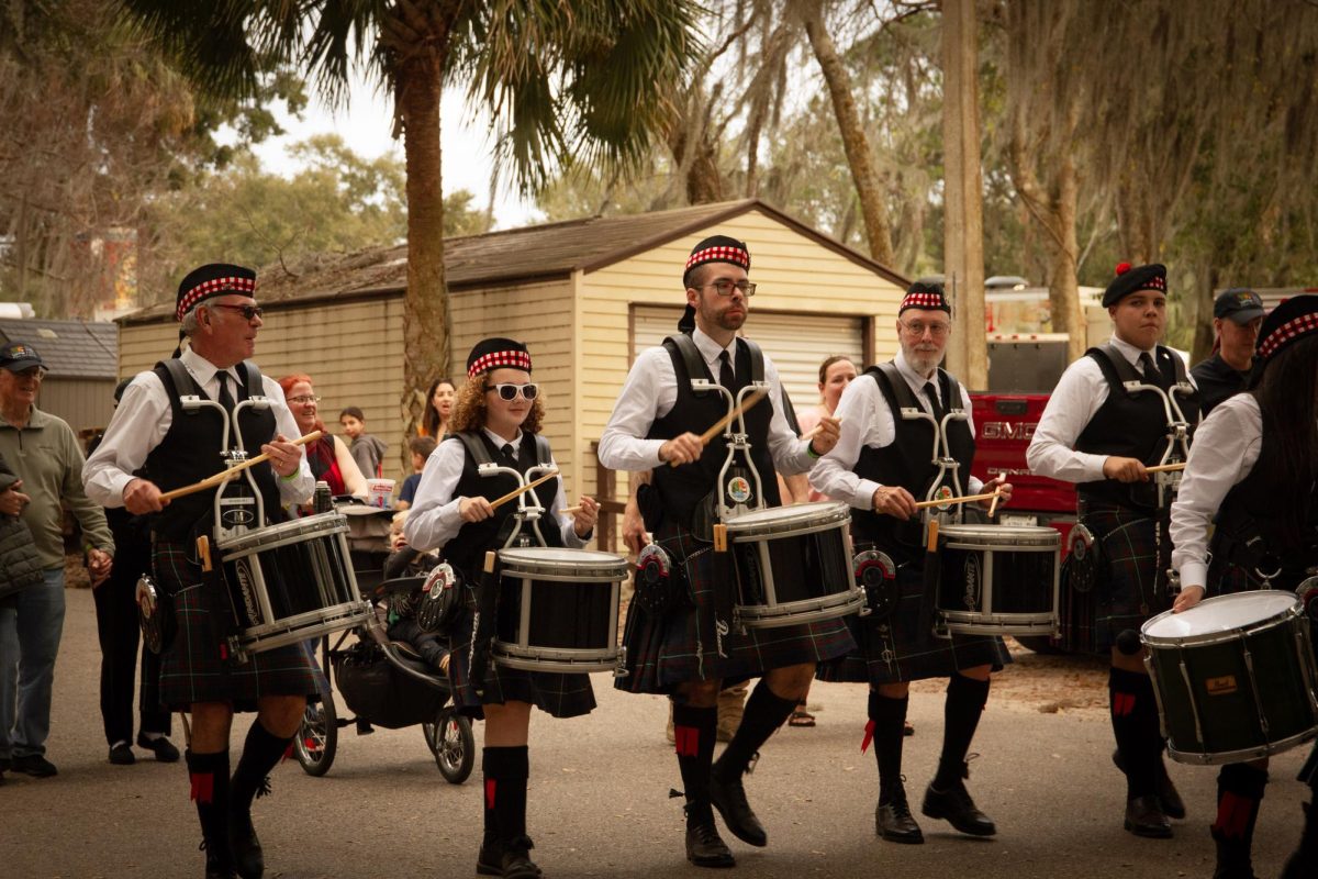 The pipers pipe and the drummers drum through the paths in the park in Winter Springs. This is one of the many sights to see at the yearly Central Florida Highland Games! There are shops, foods, games, creatures, and merriment more to see, too. 