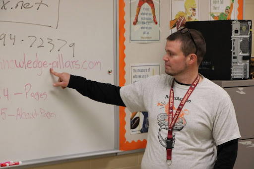 Kevin Patterson stands at a whiteboard, teaching a class on his last day at Oviedo High School. He will be taking on the position of ePathways Facilitator at the district level and helping build CTE programs across the county. Though he is changing positions, Patterson doesn’t see his new job as a career change, but rather a logical next step. “It’s gotten to a point where I feel like there’s a lot of stuff that I have yet to learn that I want to be able to learn. I’m gonna need to step into a new position to do that,” Patterson said.