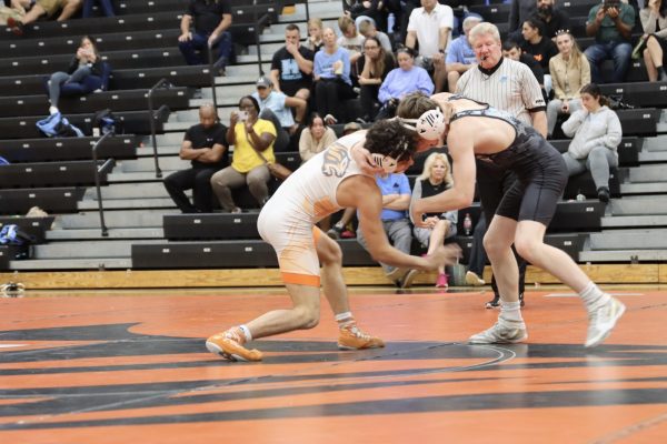 Senior Joshua Sabbia shoots in on the Hagerty wrestlers leg.