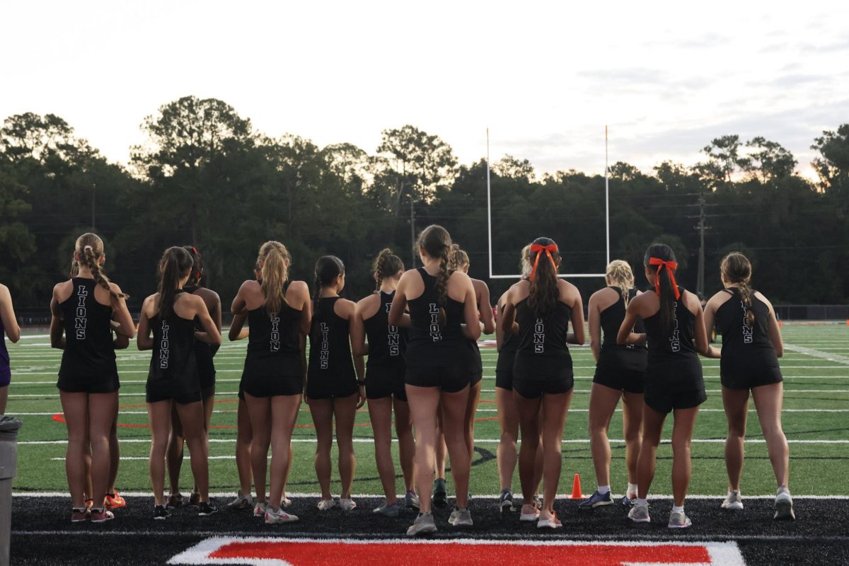 The girls cross country team getting ready to race at the Seminole Athletic Conference Championship on Oct. 18, 2025.