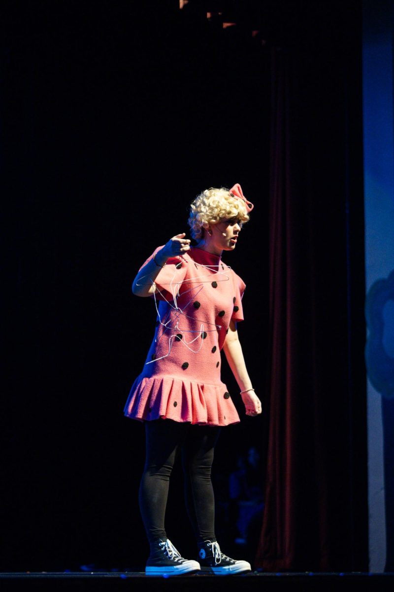 Sally Brown (Anna Kirk, 9) complains about her "C" grade for her coat hanger sculpture.