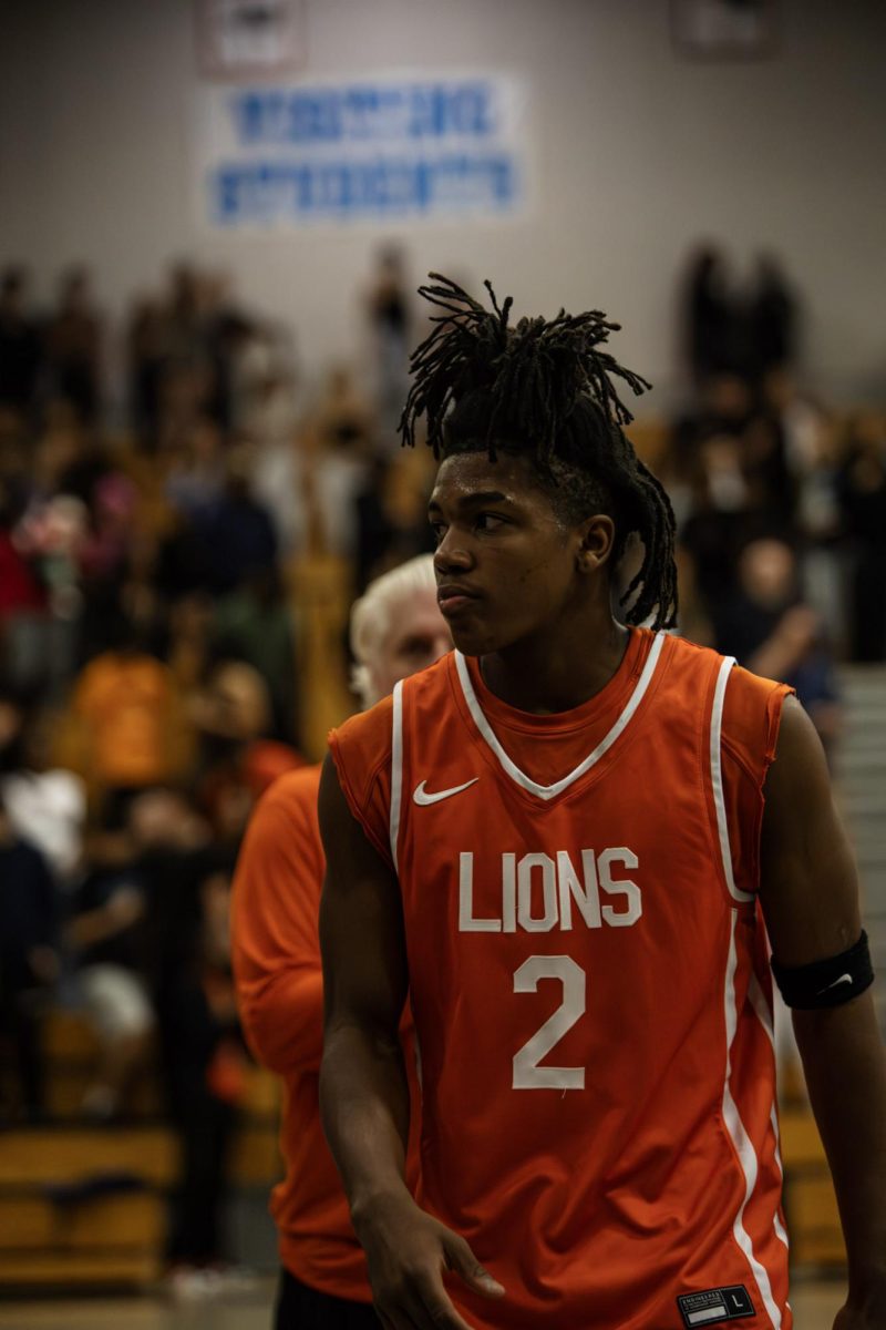 Point guard Carter Oden in between quarters preparing to get back on the court.