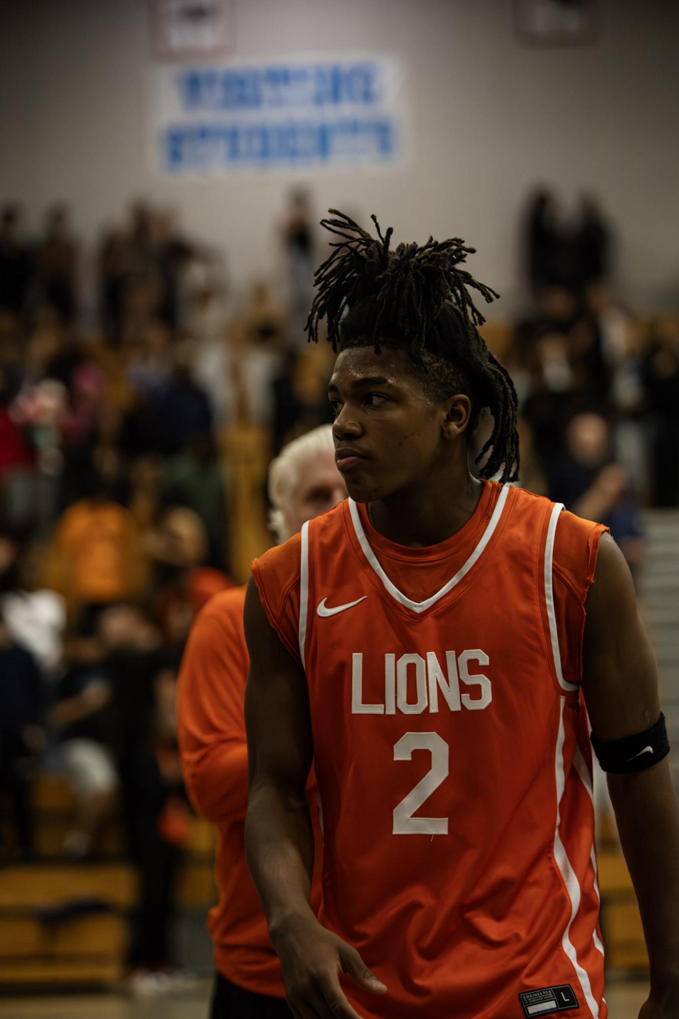 Point guard Carter Oden in between quarters preparing to get back on the court.