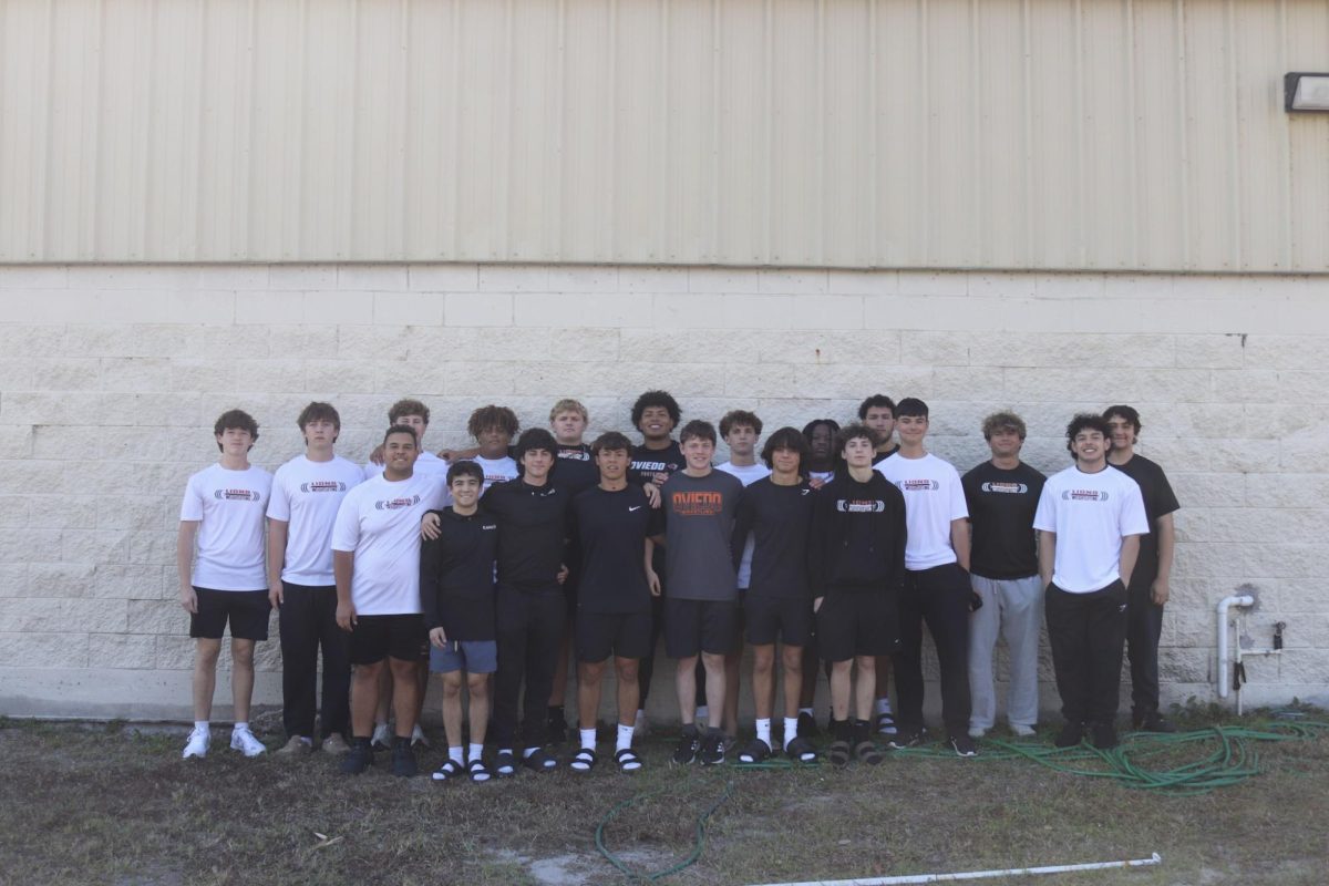 The Oviedo boys weightlifting team poses in front of the weightroom before a 52-34 victory in a dual meet over Lake Mary.